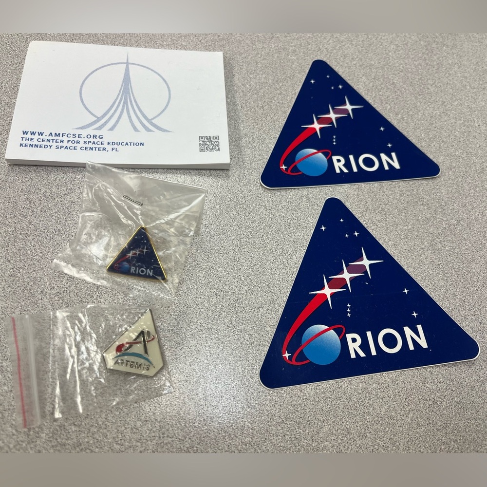 - Lot of NASA Orion, Artemis & Kennedy Space Center pins, stickers & post its